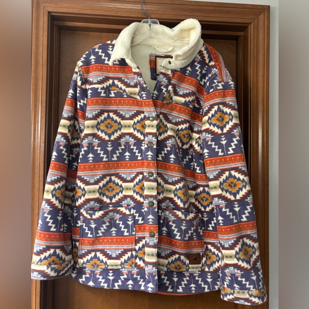 NWOT authentic Yellowstone Aztec patterned Sherpa lined jacket with suede fringe